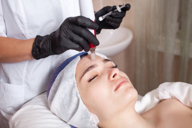 istock The beautician performs the procedure micronidling, dermopen 1254101668