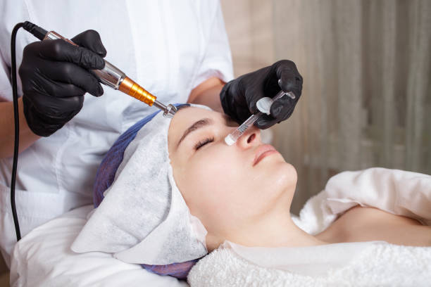 istock The beautician performs the procedure of electroporation 1254101738