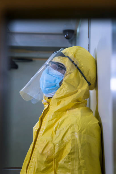 istock Epidemic worker Paramedic portrait in protective equipment 1254105222