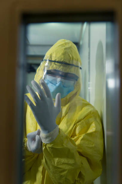 istock Epidemic worker Paramedic portrait in protective equipment 1254105253
