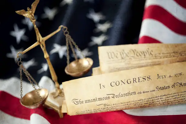 Photo of Besty Ross American Flag, Declaration of Independence and The US Constitution