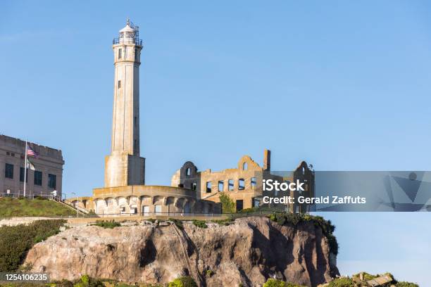 Lighthouse On Alcatraz Island In Full Sun With Ruins Stock Photo - Download Image Now