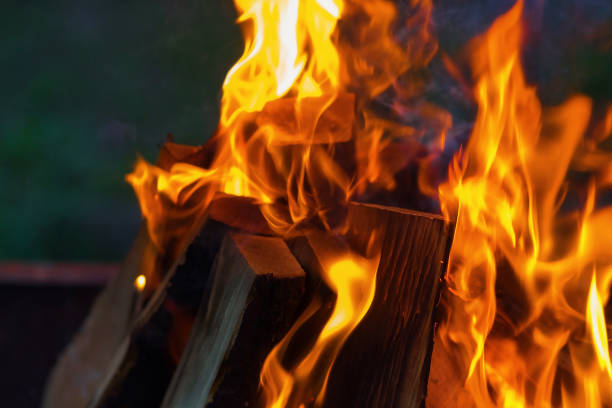 Burning charcoal in the fire for barbecue. Red hot embers.