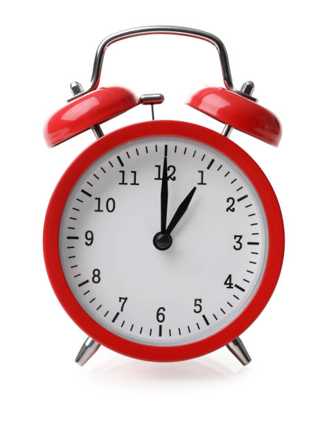 istock Red alarm clock set at one isolated over white background 1254124163