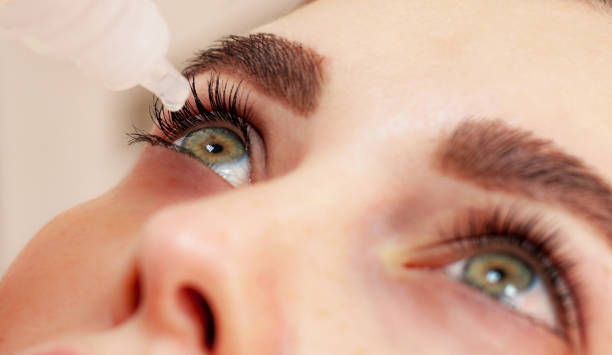 istock woman use the eye drops 1254124775