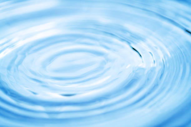 istock Circles on a water. Abstract light blue background. 1254125181
