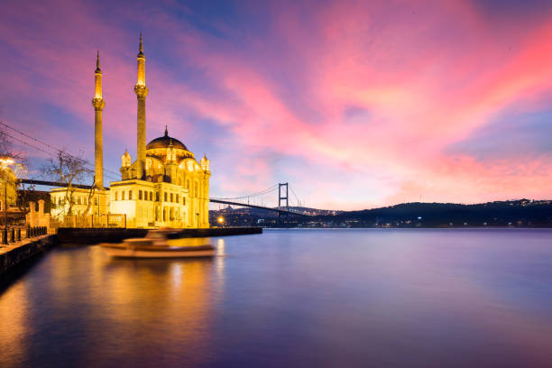 istock Lovely Sunrise over Ortakoy Mosque with Bosphorus Bridge View in the Background 1254128371