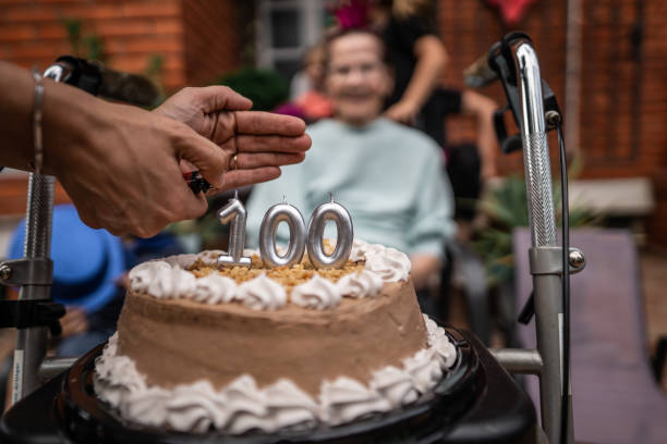 Surprise senior woman birthday party Surprise grandmother's birthday party with family in front yard over 100 photos stock pictures, royalty-free photos & images
