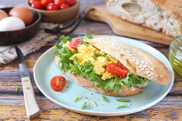 istock French bread sandwich with scrambled eggs, lettuce and cherry tomatoes 1254136878