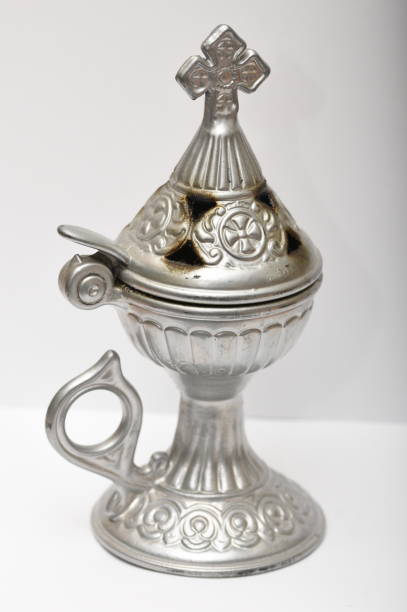 istock Incense burner - vintage brass burner isolated on white 1254137998