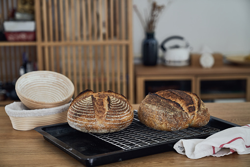 Artisan Sourdough Bread on wooden table  with background