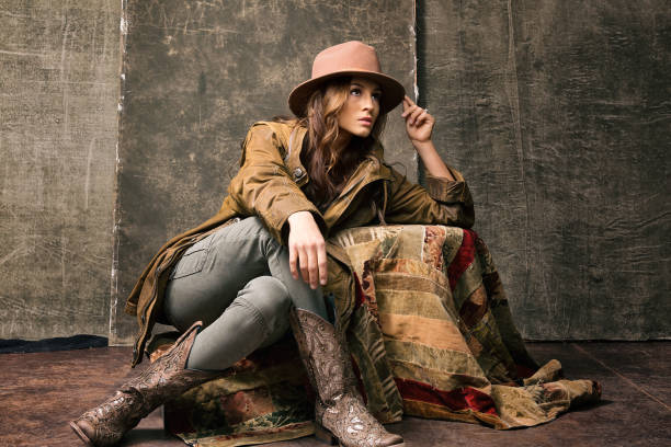 istock brunette in ralph lauren tones tipping hat 1254141617