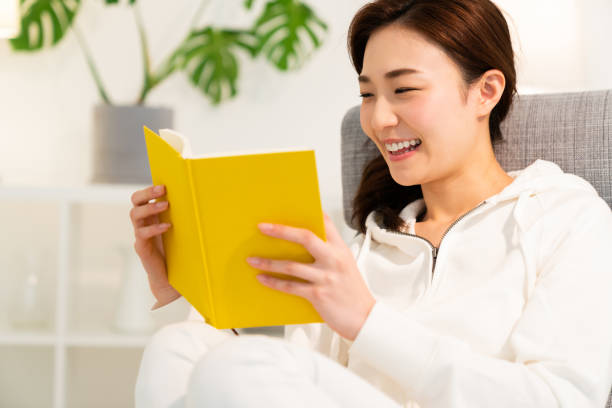 istock asian woman who reads a book 1254143290