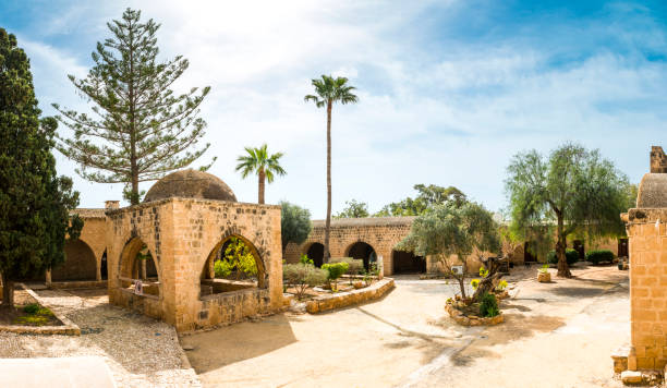 Ayia Napa, Cyprus - March 4, 2018: Ancient Orthodox Monastery. Panoramic view of the yard. Sunny summer day