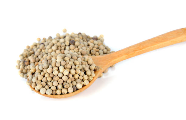 istock White pepper grains isolated on white background 1254150159