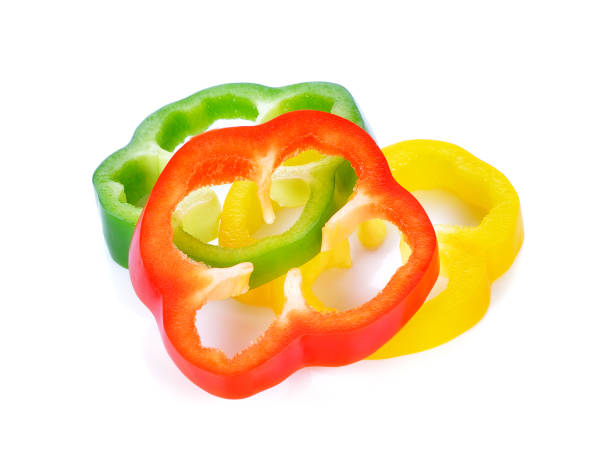 istock Sliced red yellow green pepper isolated on white 1254150169