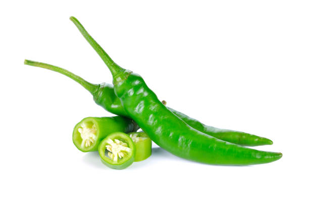 istock Green hot chili pepper on white 1254150233