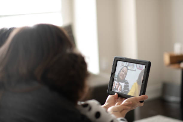istock Family video chats with grandma remotely 1254160586