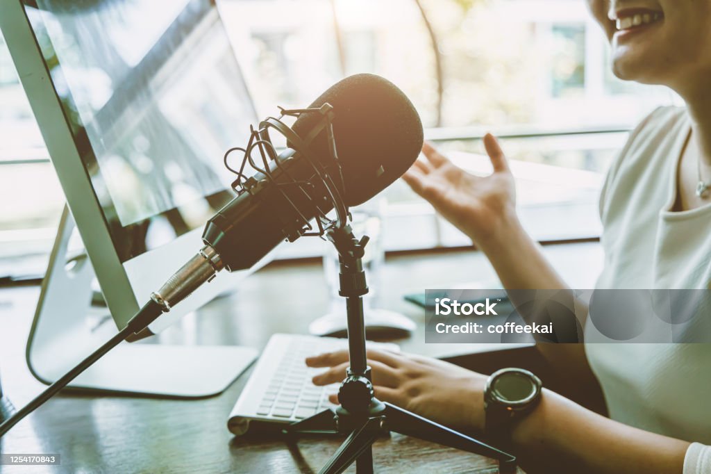 People working at home for making internet radio broadcasting channel live streaming talking meeting or discussion closeup condenser microphone. Podcasting Stock Photo