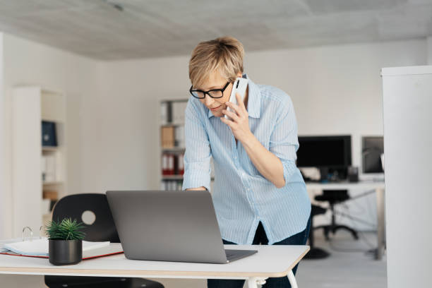 istock Businesswoman taking a call on her mobile 1254171831