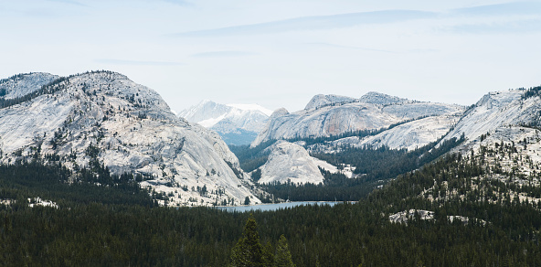 Aerial view overlooking Yosemite National Park. High alpine mountains, deep forests and turquoise lakes.
