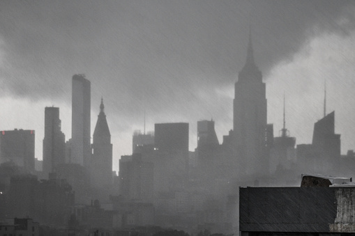 Midday darkness during a hailstorm over Manhattan's skyline