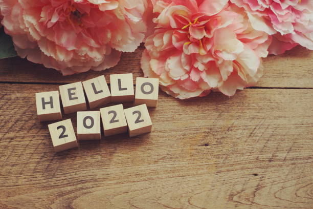 istock Hello 2022 alphabet letter with space copy on wooden background 1254174547