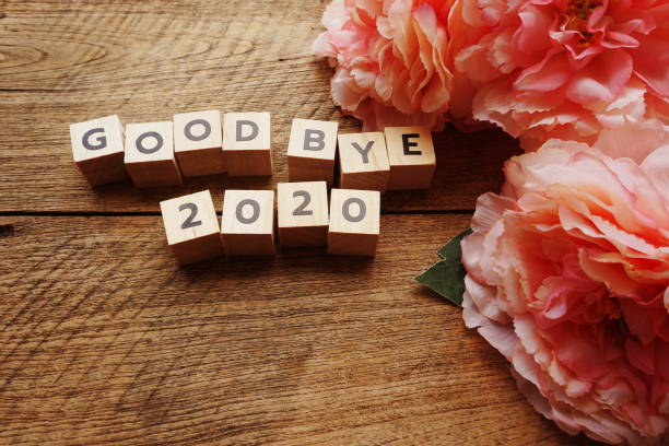 istock Good Bye 2020 word letter with space copy on wooden background 1254175175