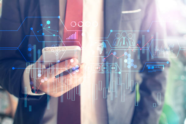 istock Businessman holding in hand tablet with global connection concept 1254175413