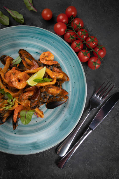 istock Seafood salad with lime and basil 1254184606