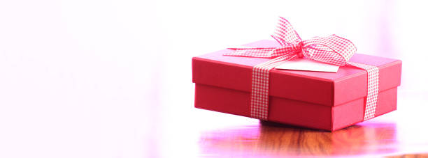 istock red christmas present with bow and copy space 1254186993