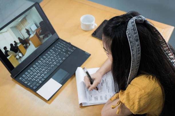 istock Teenager student studies online via laptop 1254187040