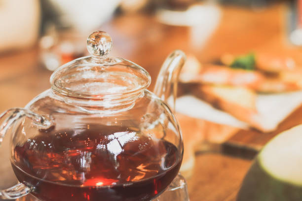 istock teapot at a cafe blurred background and garlic bread. 1254187959