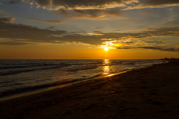 istock Colorful sunrise over sea 1254189078