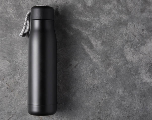 istock Reusable water bottle on a concrete background 1254195859