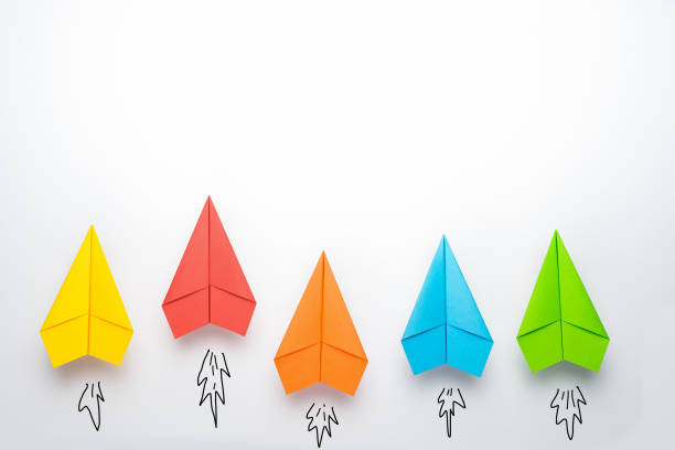 istock paper plane on white background, Business competition concept. 1254196447