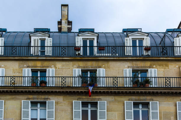 istock Paris exterior windows seen of a building facade 1254197063
