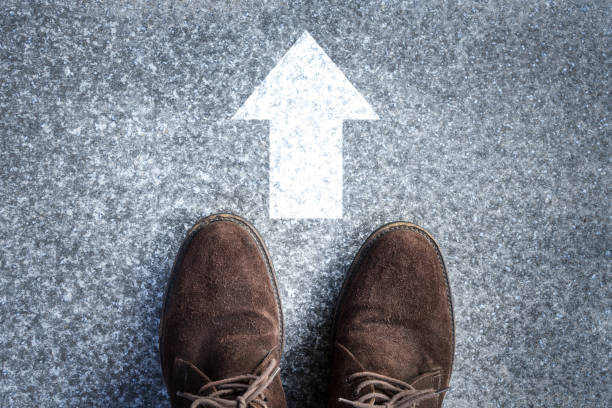 istock shoes standing on the concrete floor to go ahead 1254197323