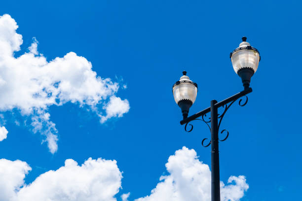 Street lamp against a sunny day