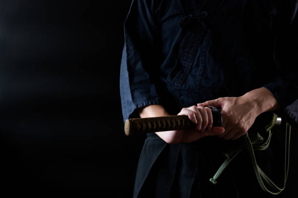 istock The man holding japanese sword 1254204538