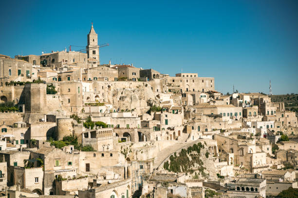 istock Panoramic view of the ancient Sassi district of Matera with mirror reflection, Italy 1254206005