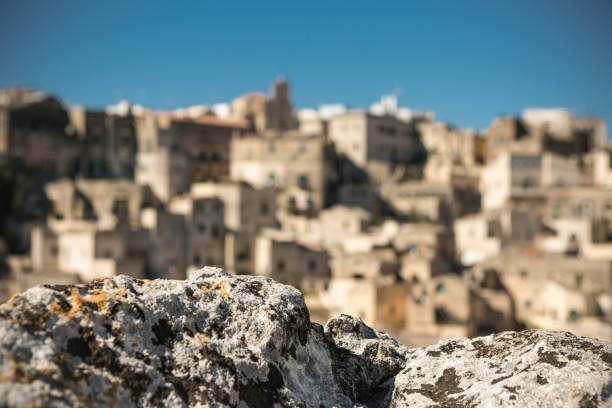 Panoramic view of the ancient Sassi district of Matera with mirror reflection, Italy