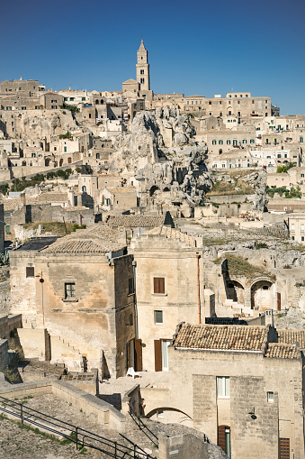 Panoramic view of the ancient Sassi district of Matera with mirror reflection, Italy