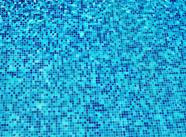 istock Surface of blue ripped water in swimming pool 1254207891