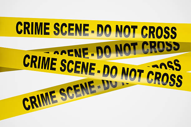 istock Yellow crime scene tape on white background 125420883