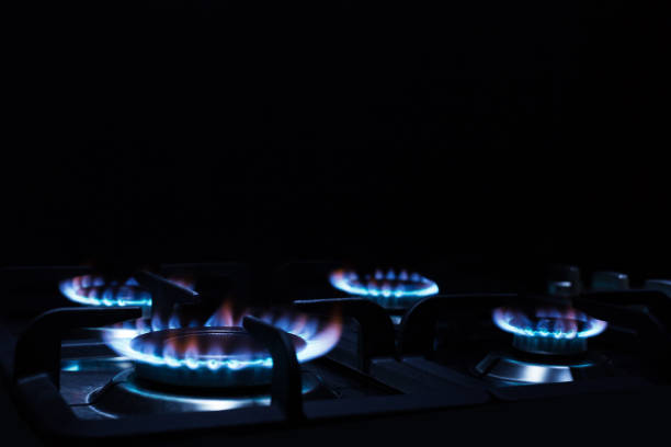 istock Kitchen burner flaming in the dark 1254209180