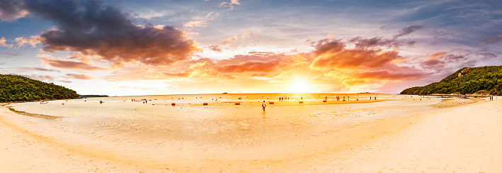 Panorama shot The beach with sunset and cloud in golden hours.