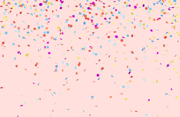istock Colorful confetti on the pink background. 1254211602
