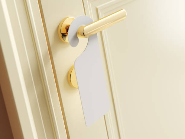 istock Luxury hotel door with empty label 