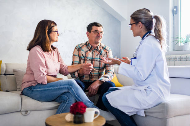 istock Healthcare worker at home visit 1254212809